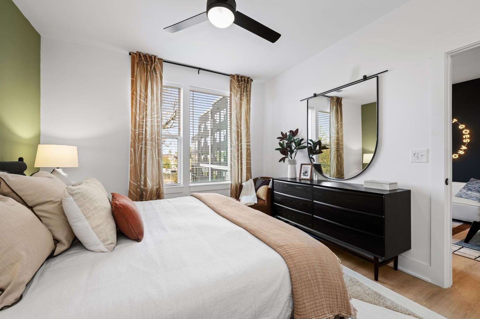 Elan LoSo bedroom with dresser and arched mirror