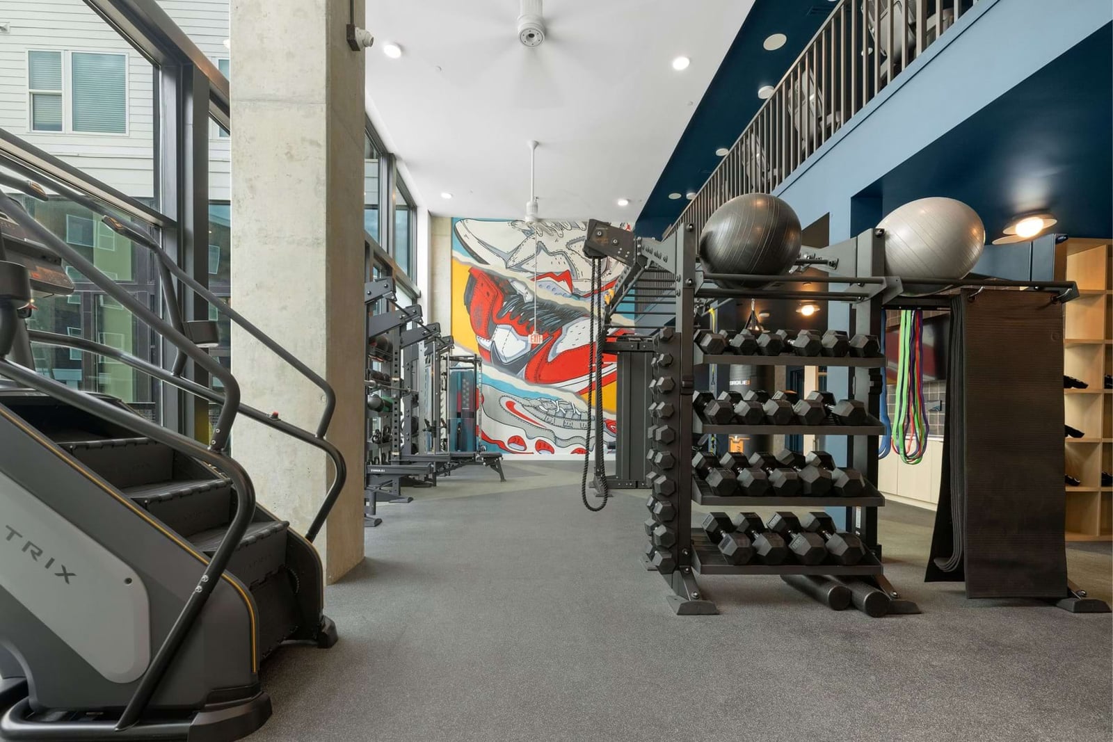 Elan LoSo two-story fitness center with mural