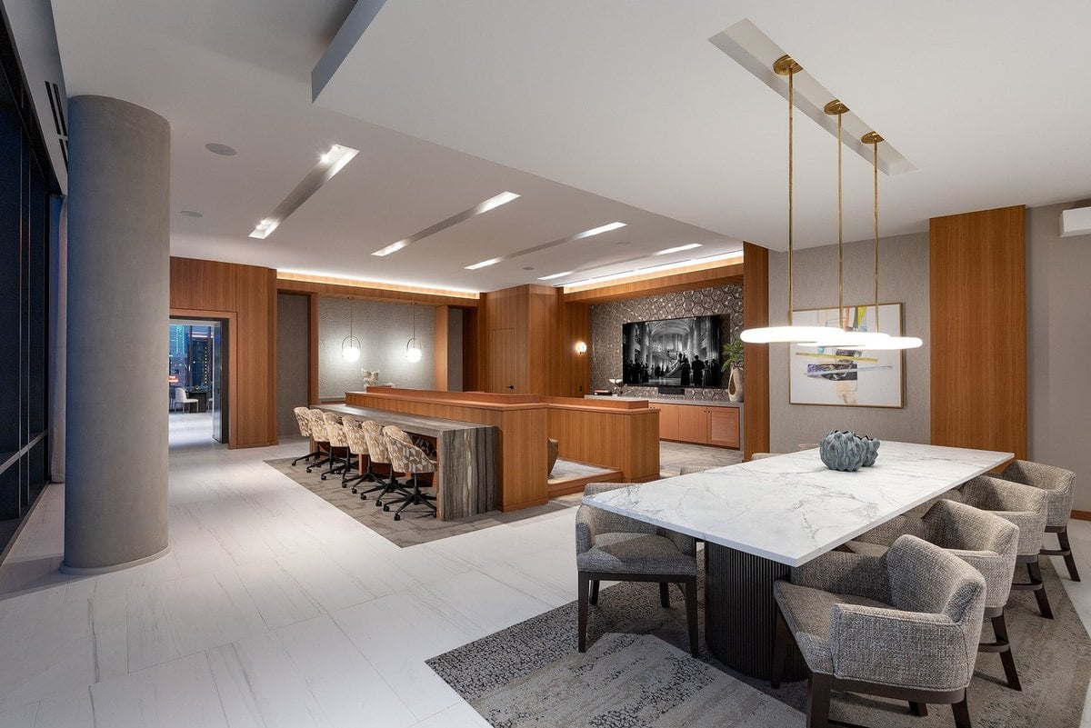Parkview Turtle Creek resident dining room with wood wall paneling