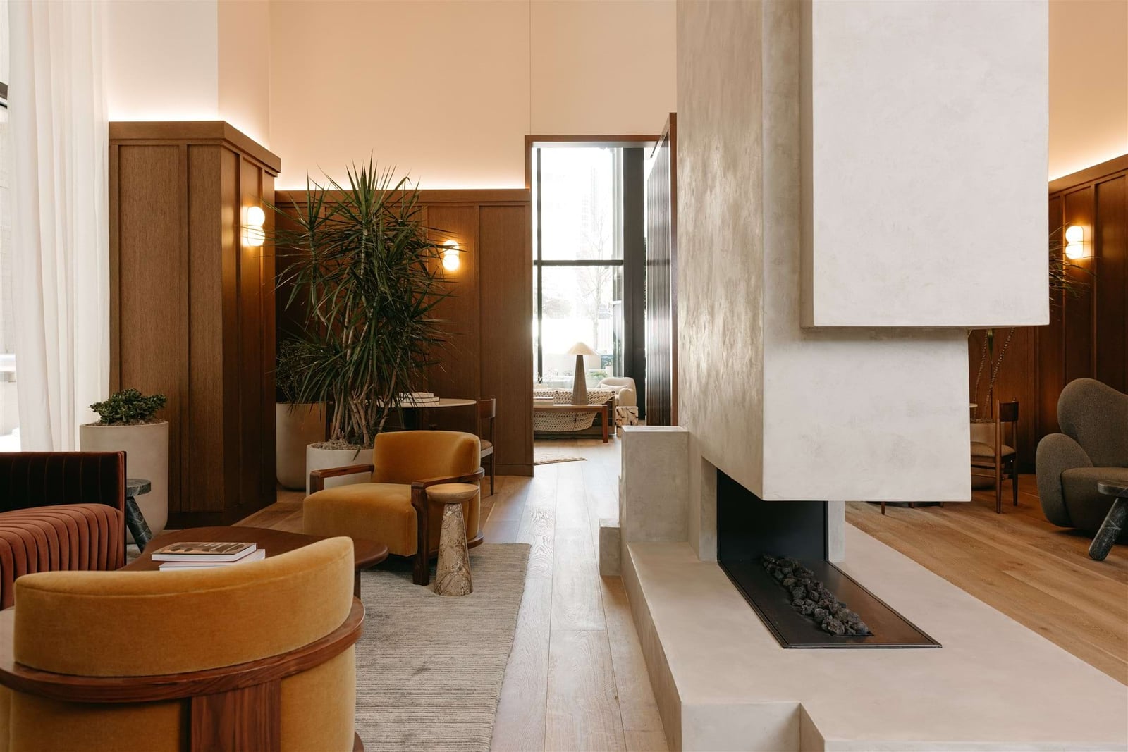 Peridot Residences lounge with fireplace