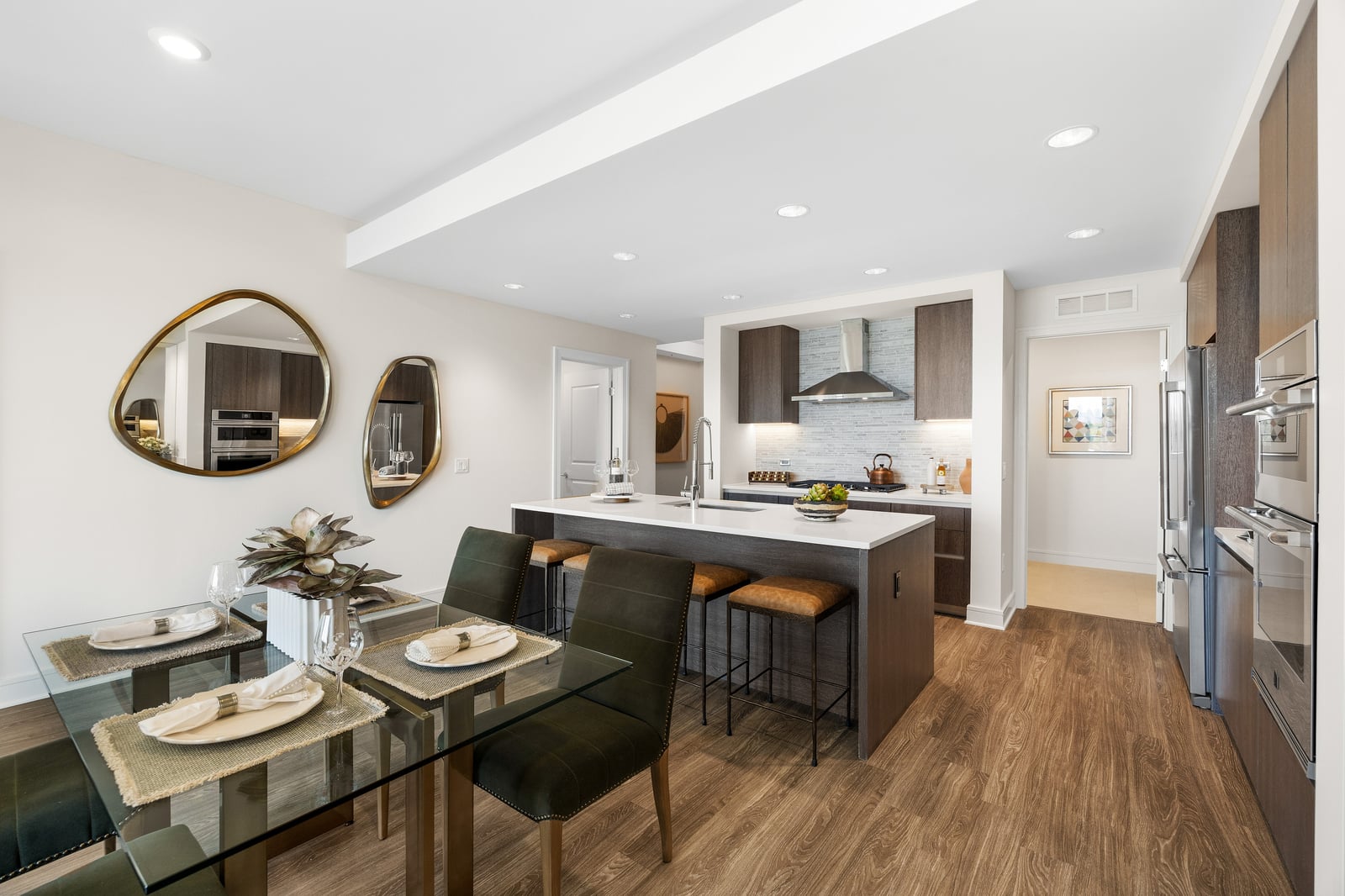 Preston Hollow kitchen and dining room with wood cabinetry