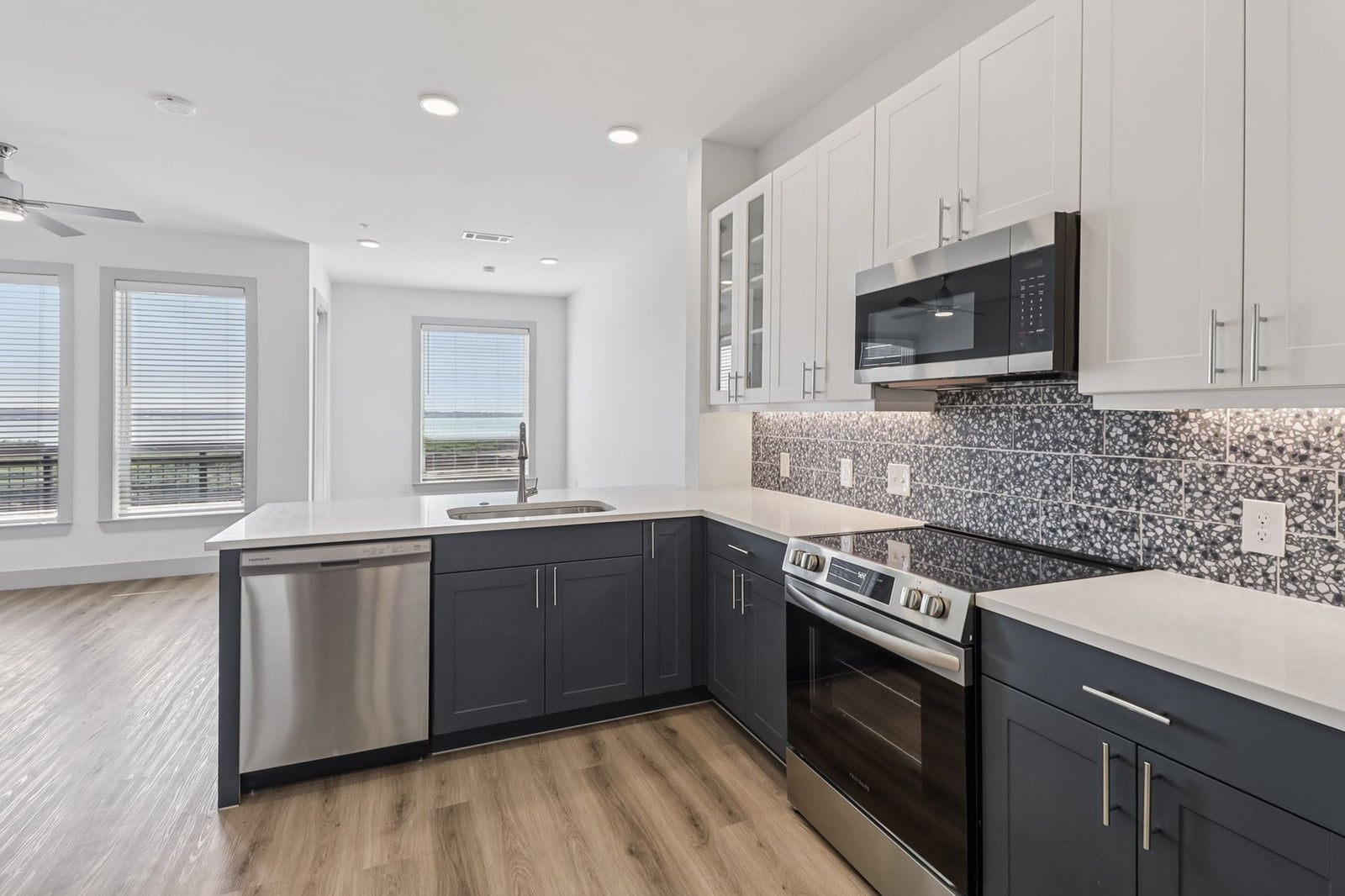 Surfside at Sapphire Bay kitchen with peninsula and lake view windows