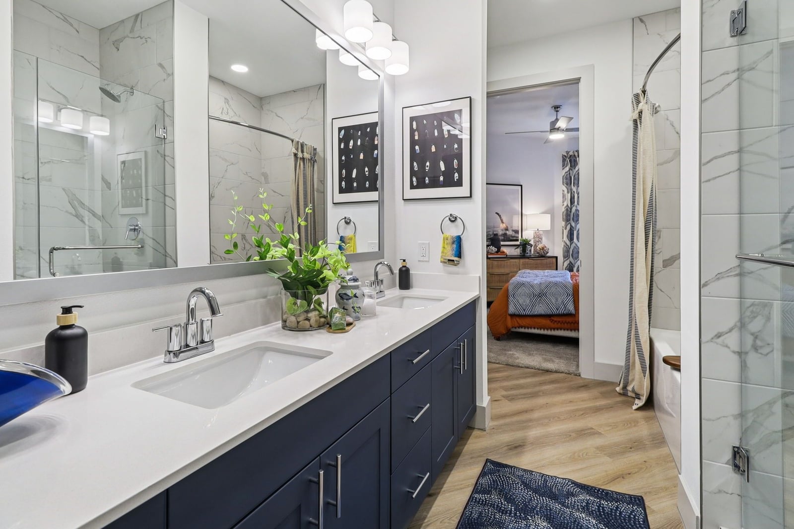 Surfside at Sapphire Bay bathroom with navy double vanity and walk-in shower