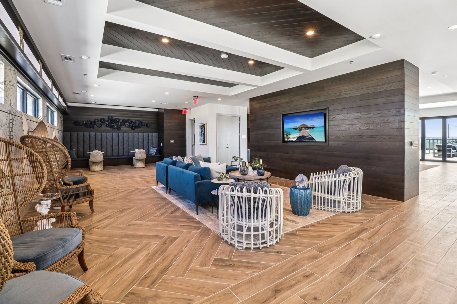 Surfside at Sapphire Bay rooftop lounge with wood accent walls and coffered ceiling