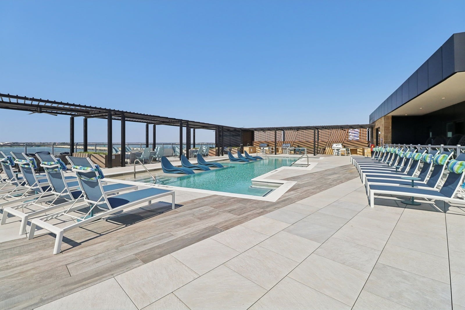 Surfside at Sapphire Bay rooftop pool deck with pergola and lake view