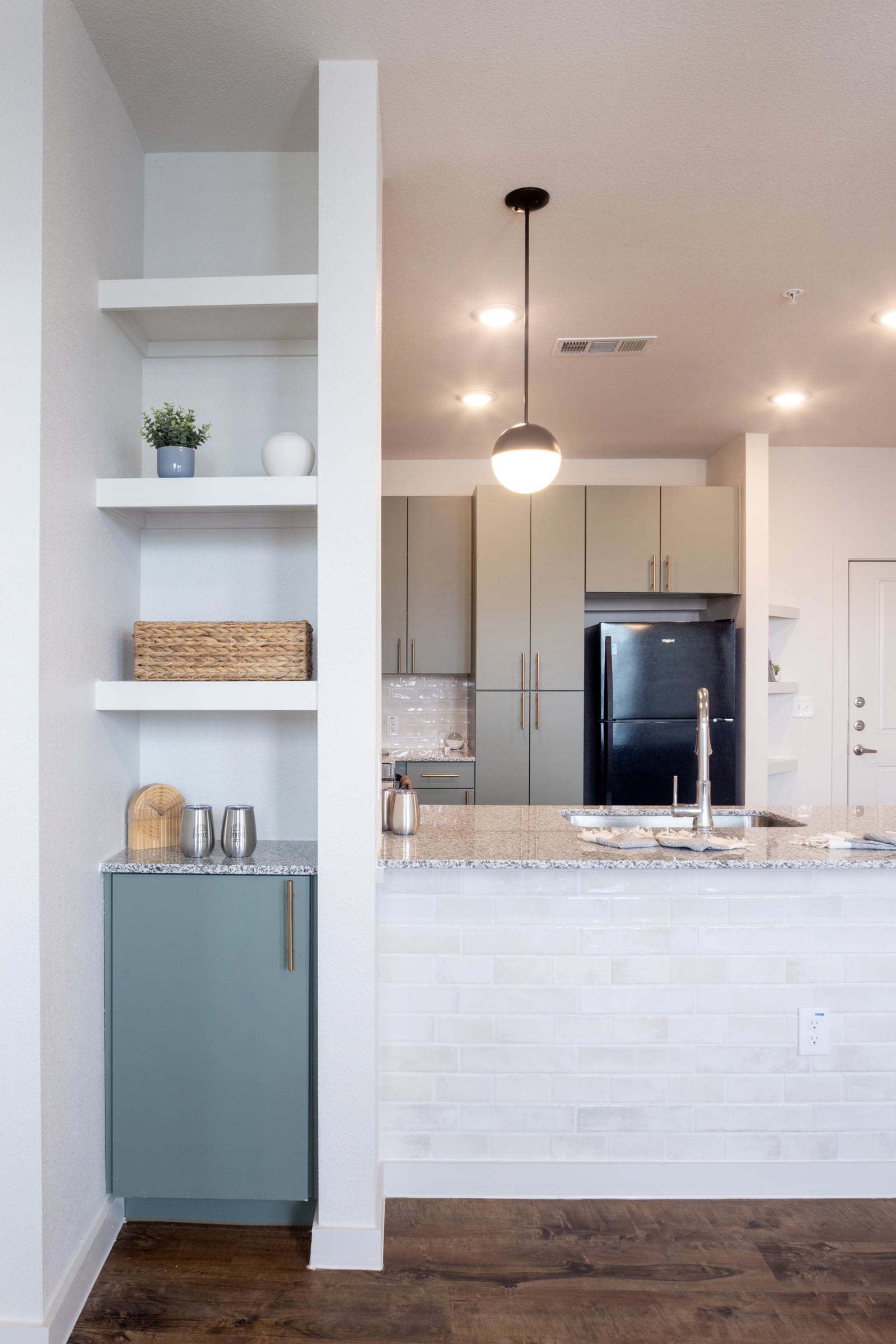 The Rhett built-in shelving beside the kitchen pass-through