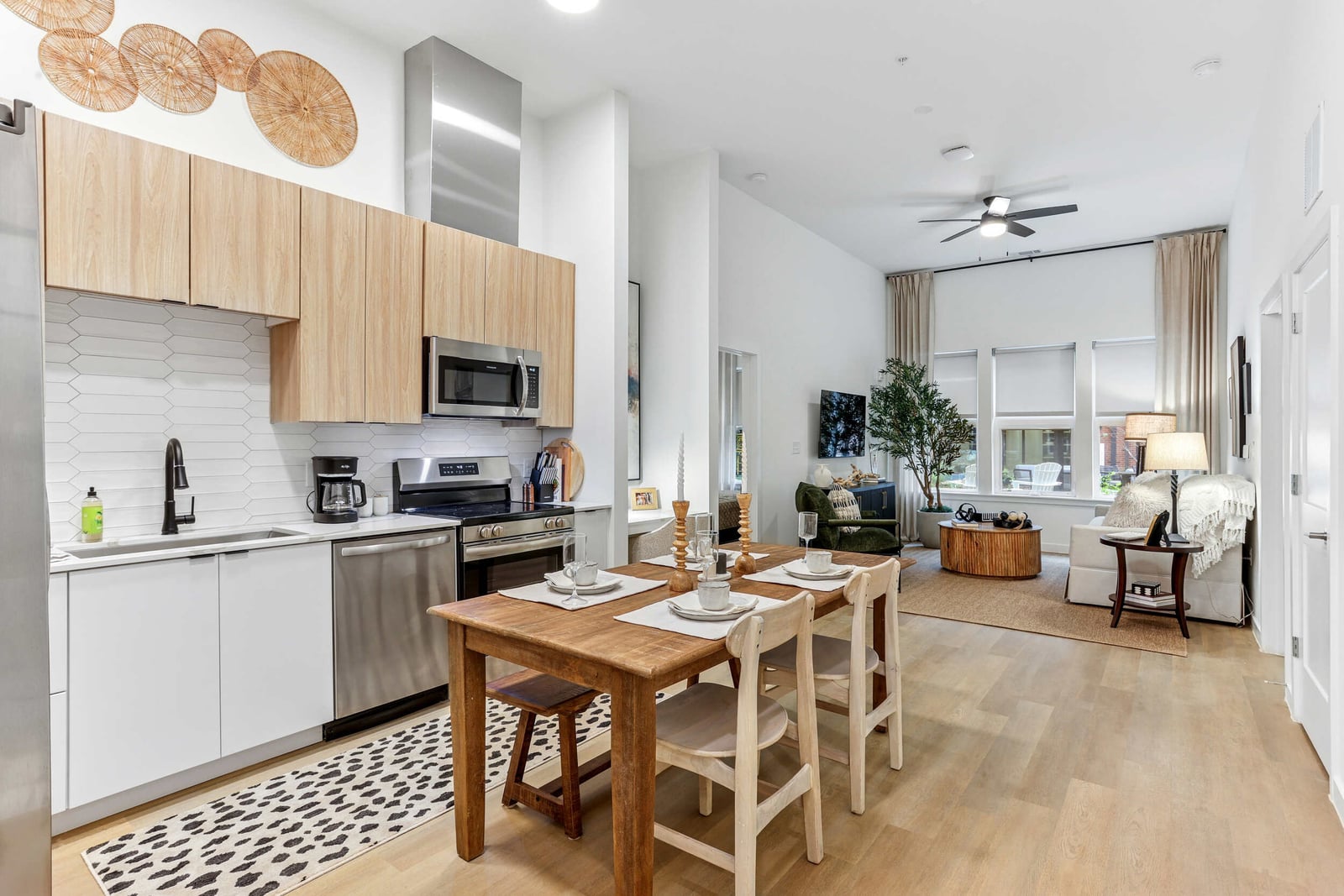 Wellory Living kitchen, dining table and living room in an open plan