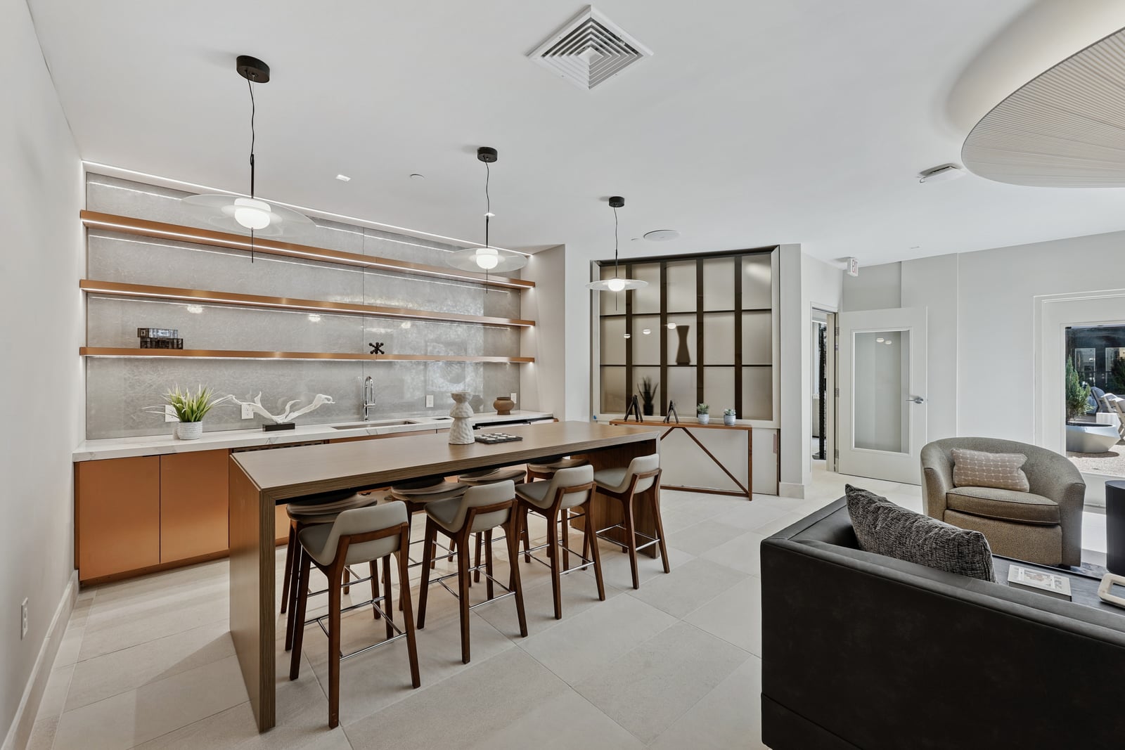 Wellory Living club room kitchen with island seating