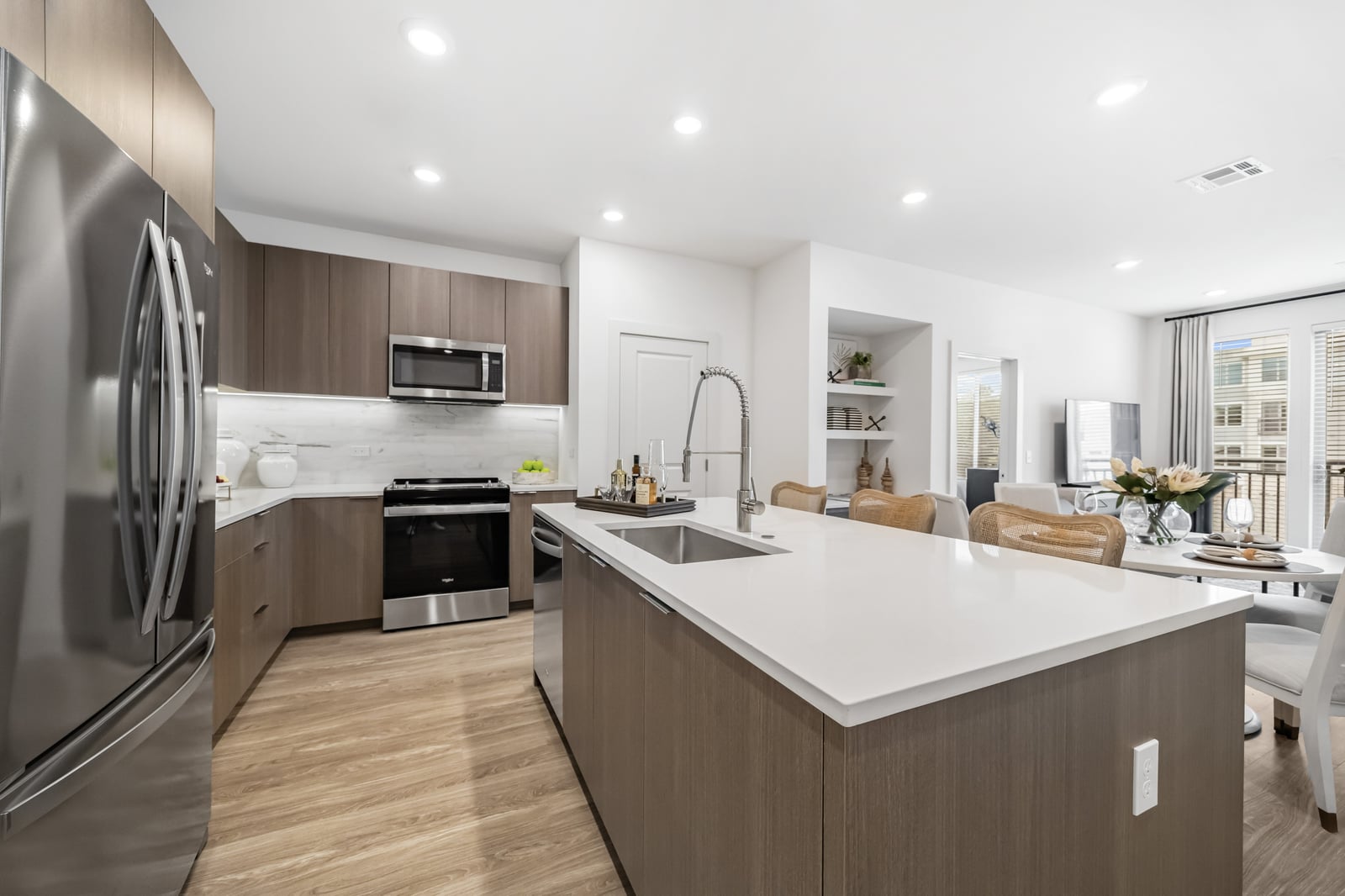 Weymouth kitchen with stainless appliances and white counter-height island