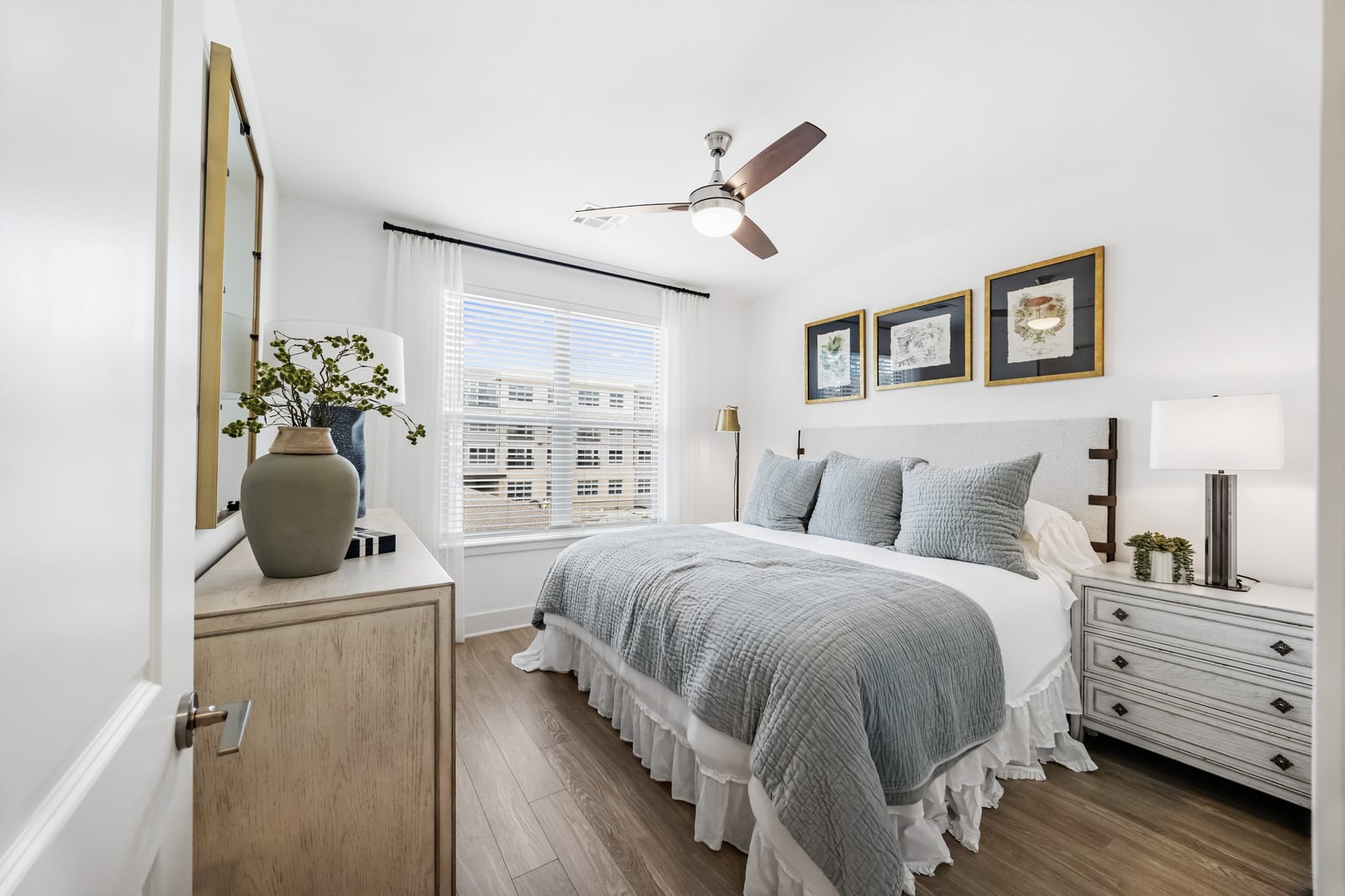 Weymouth bedroom with ceiling fan and dresser